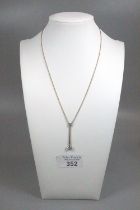 15ct gold chain with aquamarine drop pendant. 3g approx. (B.P. 21% + VAT)