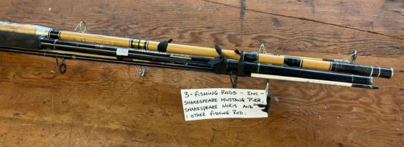 Three modern fishing rods to include: Shakespeare Mustang Pier, Shakespeare Noris and another (