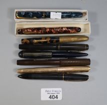 Collection of vintage pens, to include: Parkette 14K nib with marbled designs, Burnham and other 14K