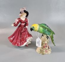 Beswick 930 Green Parrot, together with a Royal Doulton figure of the year 1993 Patricia HN3365. (2)