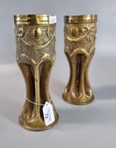 Trench Art - pair of German brass shell cases embossed and fashioned into ribbed vases. 22cm high