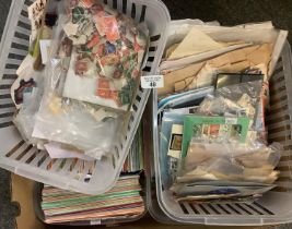 All world collection of stamps in home made club books and two plastic boxes of stamps in bags,