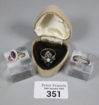 9ct gold cubic zirconia and purple stone dress ring. 1.8g approx. Size O. Together with an Art