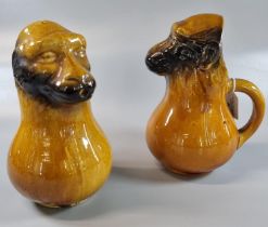 Pair of probably French Ale pitchers in the form of monkeys. 22cm high approx. (2) (B.P. 21% + VAT)