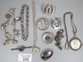 Bag of silver and other jewellery to include: charm bracelet, Victorian and other brooches, some