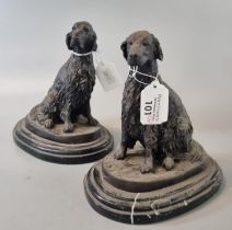After Barye, two bronze studies of seated Setter dogs on marble finish bases. (2) (B.P. 21% + VAT)