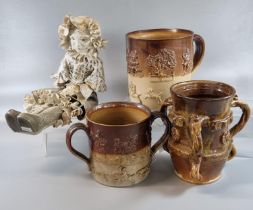 Two 18th/19th century salt glazed stoneware harvest jugs/loving cup, each with sprigged toping and