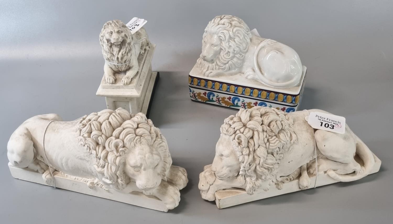 Pair of 'The Chatsworth Crouching Lions' (modern), together with a marble finish of a male Lion on