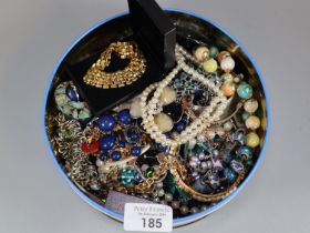 Blue and white tin comprising costume jewellery. (B.P. 21% + VAT)