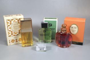 Three designer perfumes and aftershave to include: Christian Dior Paris 'Dune', Paco Rabanne 'Pour