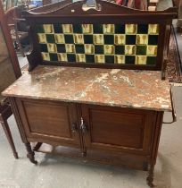 Edwardian Art Nouveau design marble topped wash stand with tiled back and two blind cupboards on