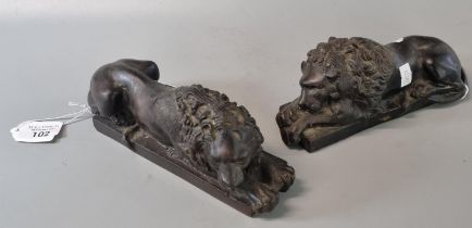 Pair of bronze recumbent male Lions on rectangular bases. (2) (B.P. 21% + VAT)