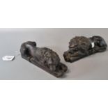 Pair of bronze recumbent male Lions on rectangular bases. (2) (B.P. 21% + VAT)