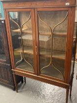 Edwardian satin wood display cabinet, the moulded cornice above a marquetry inlay of swags and