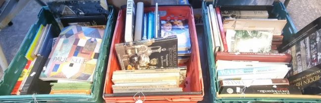 Three crates of assorted books to include: Tolkien 'The Lord of the Rings' appearing to be 10th