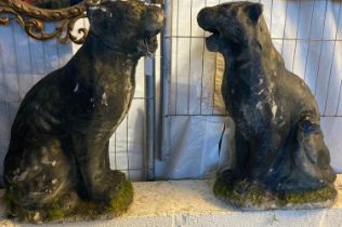 Pair of reconstituted stone garden figures of panthers. 60cm high approx. (2) (B.P. 21% + VAT)