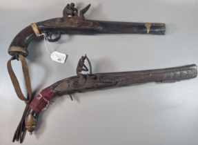 Indian or Afghan flintlock muzzle loading pistol with studded decoration and brass end cap. Together