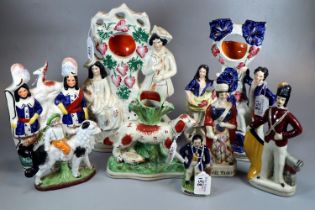 Collection of Staffordshire Flatback figurines and figure groups together with other figurines