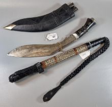 Nepalese Kukri with inlaid metal mounted grip, leather scabbard and two additional small knives.