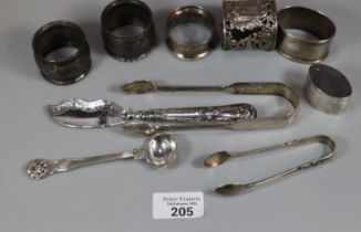 Box of assorted silver to include: napkin rings, sugar nips, pill box etc. (B.P. 21% + VAT)