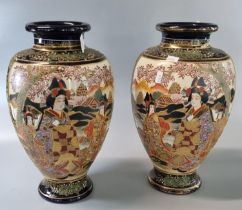 Pair of Japanese Satsuma style vases with polychrome and moriage decorated panels of figures in