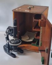 Cooke Troughton & Simms Ltd. cased microscope with serial number M70806 and microscope manual. (B.P.