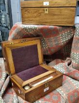 Two similar 19th century mahogany writing slopes, both with a small collection of accessories and