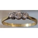 18ct gold on platinum three stone diamond ring. 1.7g approx. Size N1/2. (B.P. 21% + VAT)