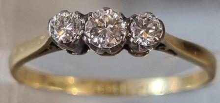 18ct gold on platinum three stone diamond ring. 1.7g approx. Size N1/2. (B.P. 21% + VAT)