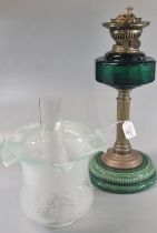Early 20th century double oil burner lamp having frilled frosted and etched glass shade above a