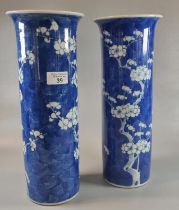 Pair of 19th century Chinese export porcelain cylinder vases decorated with flowering prunus