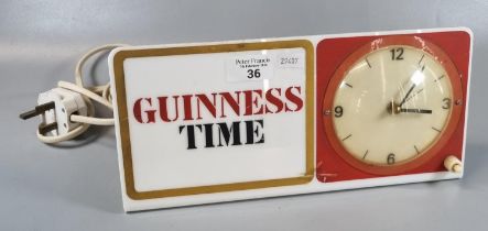 Breweriana, plastic illuminated electric 'Guinness Time' clock lamp. 30cm wide approx. (B.P. 21% +