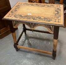 Stripped and stained oak carved side table with shaped frieze. (B.P. 21% + VAT)