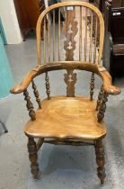 Ash and elm stick and splat backed kitchen fireside elbow chair with moulded saddle seat on baluster