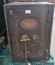 Cast iron safe by J Cartwright & Son West Bromwich together with keys. (B.P. 21% + VAT)
