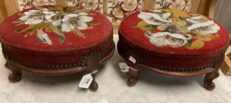 Pair of Victorian oval foot stools on short scrolled cabriole legs, having original beaded foliate