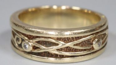 Clogau 9ct gold and diamond wedding band. 5.6g approx. Size K1/2. In original box. (B.P. 21% + VAT)