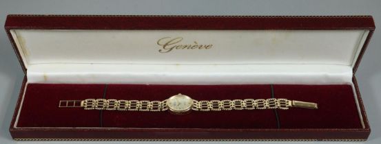 9ct gold Geneve oval ladies bracelet wristwatch with satin face, having baton numerals and bar