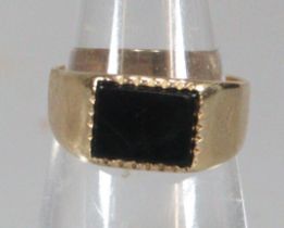 9ct gold signet type ring set in a black hardstone. 2.3g approx. Size G. (B.P. 21% + VAT)