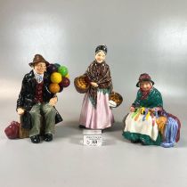 Three Royal Doulton bone china figurines to include: 'Silks and Ribbons', 'The Orange Lady' and 'The