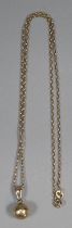 9ct gold curb link chain with 9ct gold ball pendant. 3g approx. (B.P. 21% + VAT)