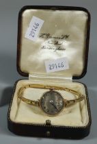 Ladies 9ct gold vintage mechanical wristwatch with Arabic face having seconds dial, marked 'Magno'