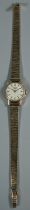 Longines 9ct gold ladies wristwatch with satin face, having baton numerals and 9ct gold bark