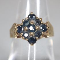 9ct gold blue multi cluster ring. 3.3g approx. Size K1/2. (B.P. 21% + VAT)