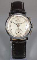 A vintage Breitling steel gentleman's two button chronograph, the face with Arabic numerals and
