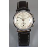 A vintage Breitling steel gentleman's two button chronograph, the face with Arabic numerals and