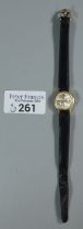 Ladies 9ct gold Omega small head wristwatch, having satin face with baton numerals and original