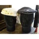 Two vintage straw cocktail hats, one with faux flower detail. (2) (B.P. 21% + VAT)