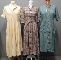 Three vintage 1940's/50's dresses; one slubbed silk with faux pearl buttons and two woollen; one