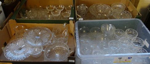 Four boxes of glassware to include: cakestands, jug, bowls, various drinking glasses, vases,